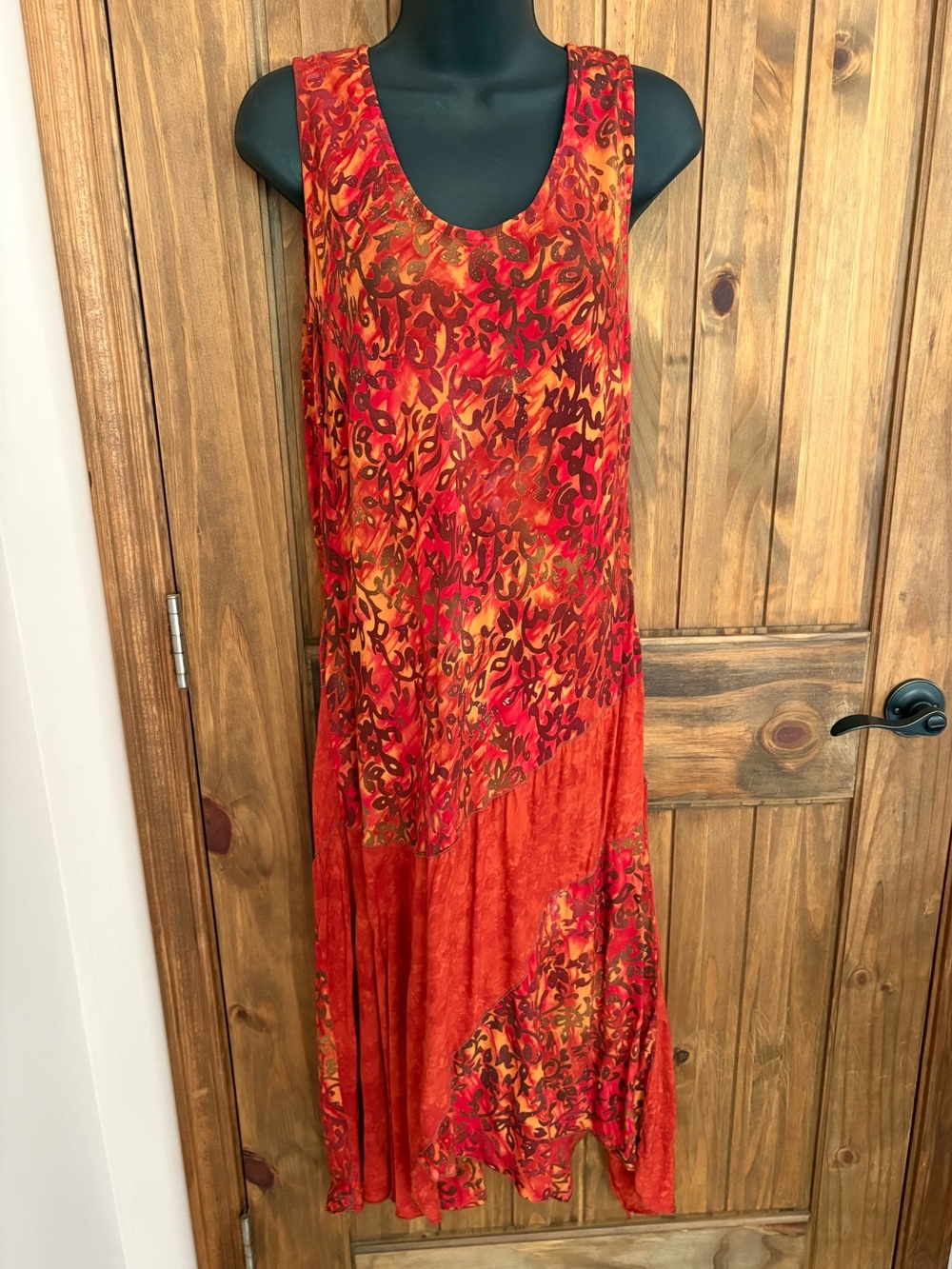 Sleeveless Red-Orange Printed Midi Dress w/shark bite hem